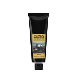 Suave pasta para peinado estilo medio, ideal para crear peinados con volumen y forma duradera, perfecta para cabello medio.